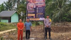 Pasang Spanduk Imbauan Kapolres, Polsek Bangko Pusako Gerakkan Masyarakat Lawan Karhutla Sejak Dini